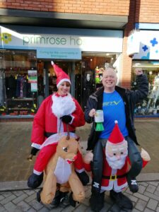 Julie Kimberley and James Cater taking part in Primrose Hospice's Santa Fun Run